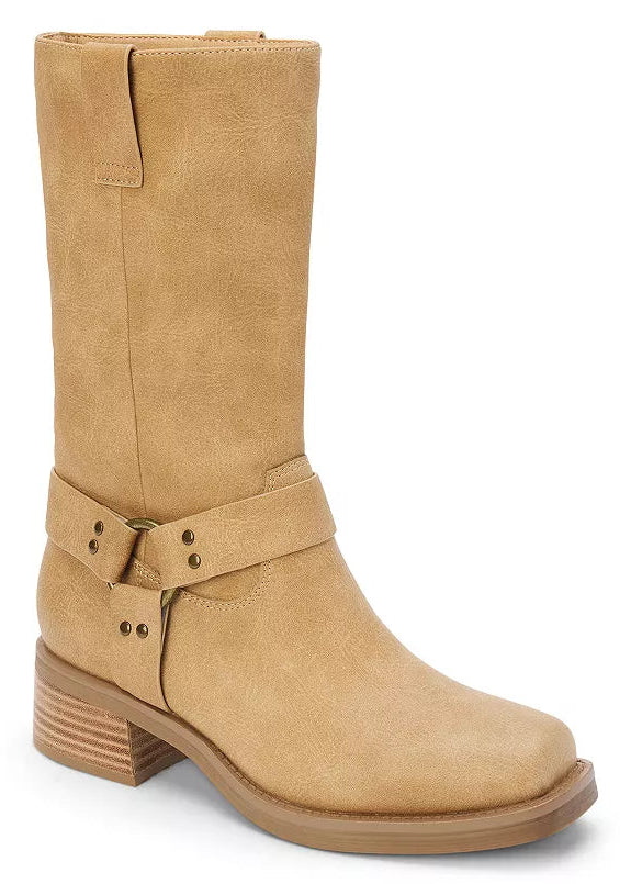 Tan boot with a strap and buckle on a white background