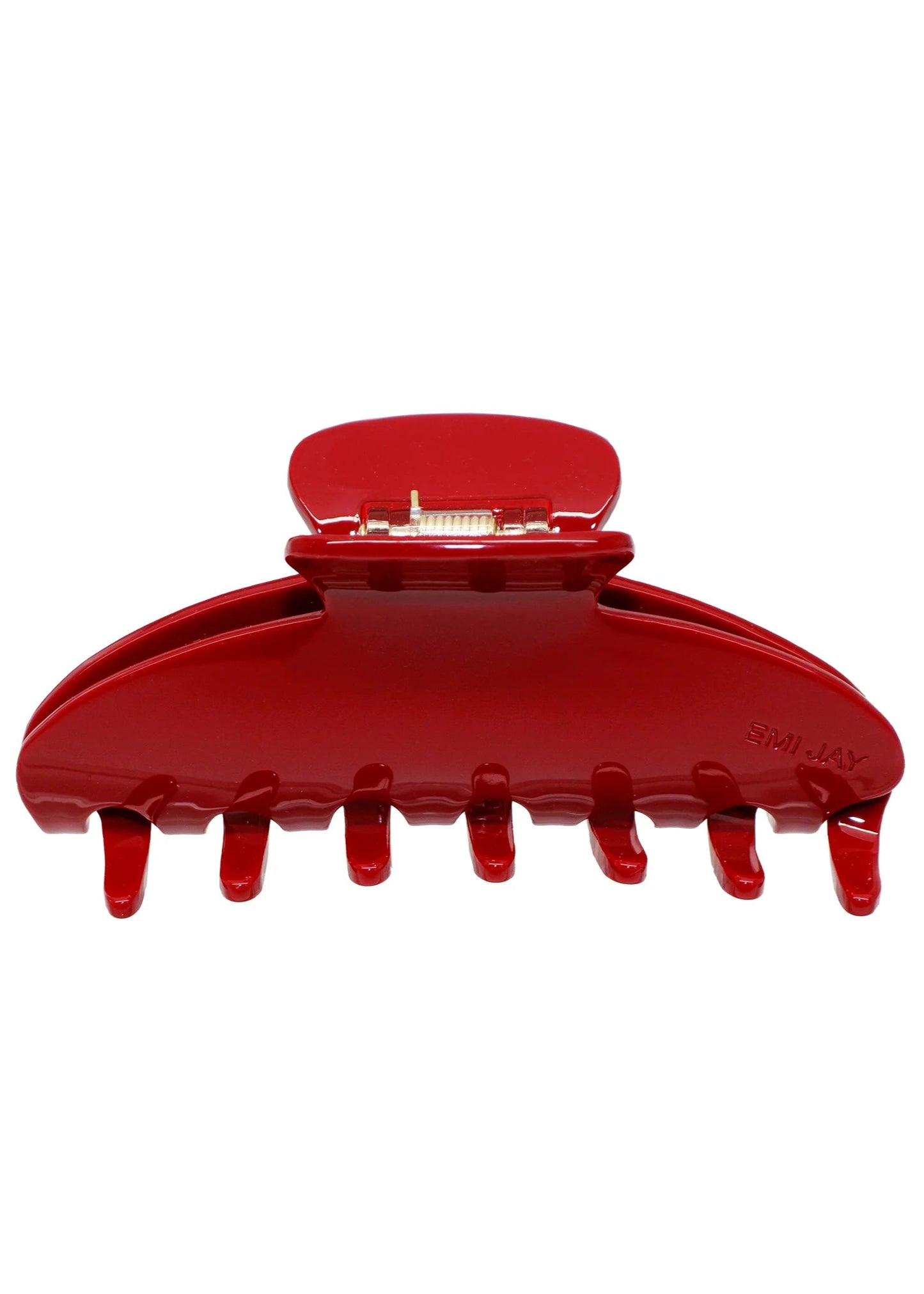 Red hair clip on a white background