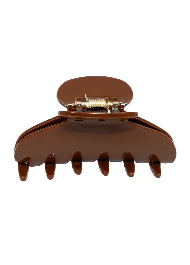Brown hair clip on a white background