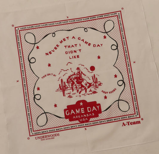 Beige tote bag with red and black graphic design featuring text and illustrations.