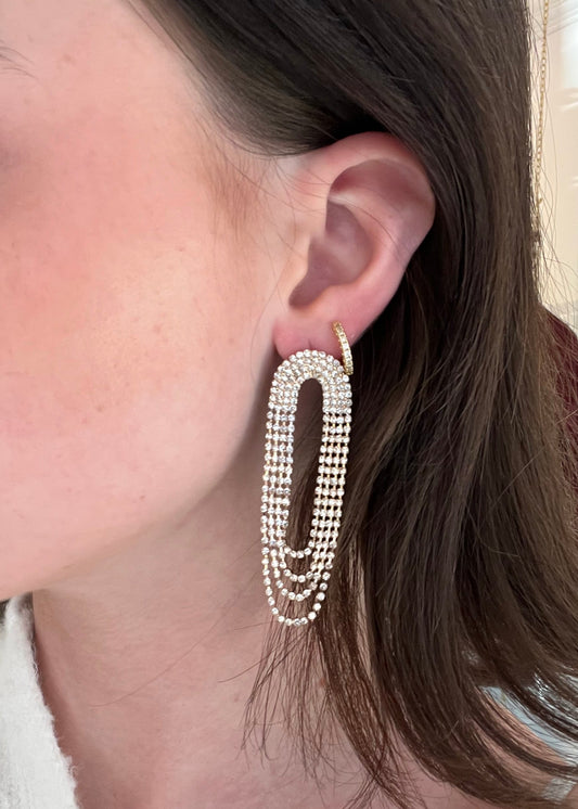 Close-up of a person with decorative hair clip in a festive indoor setting