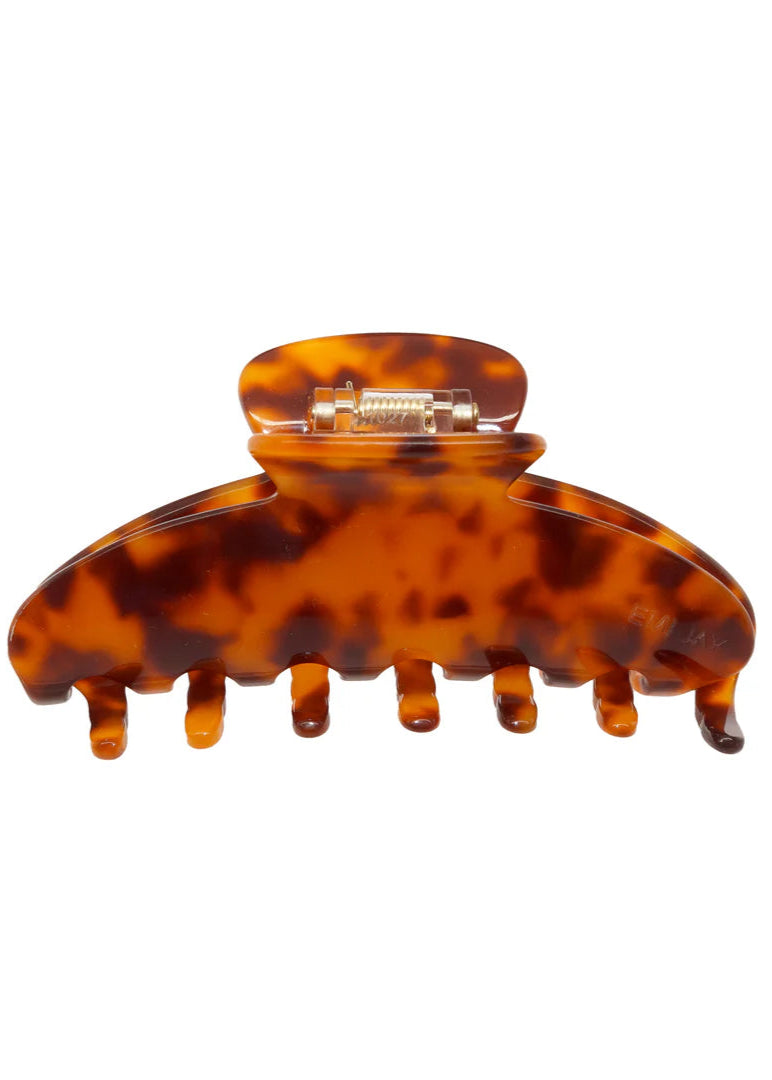 Tortoiseshell hair clip on a white background