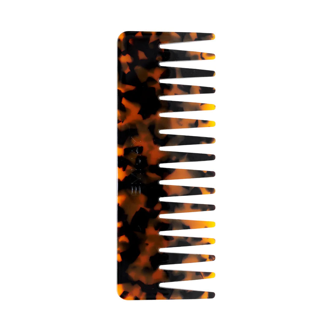 Tortoiseshell-patterned comb on a white background