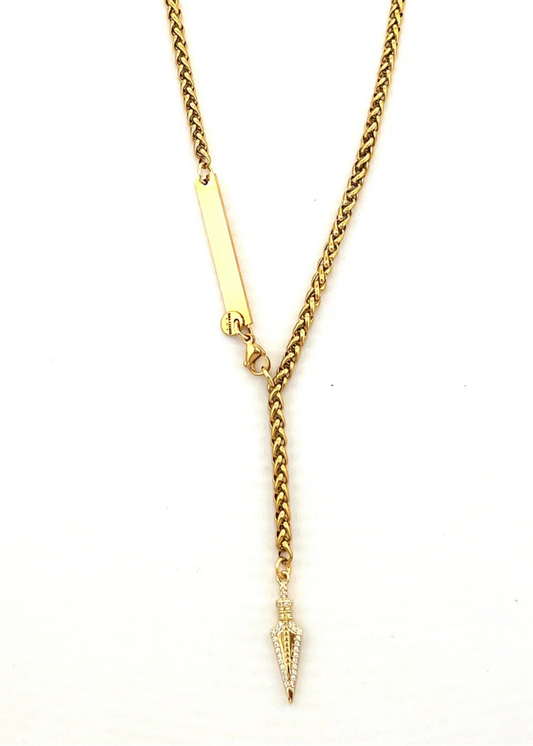 Gold necklace with a pendant on a white background